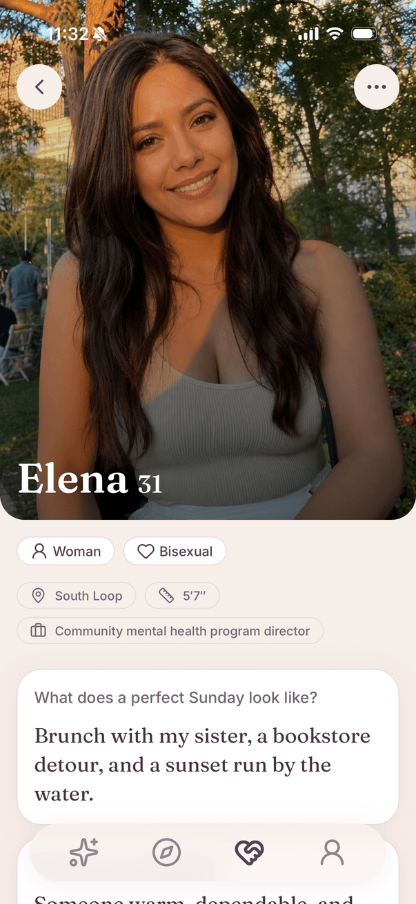 A member's profile on Discover: a photo, a first name and age, fact pills for gender, orientation, neighborhood, height and work, and one interview answer beneath.